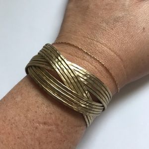 Gold style cross cross ban bracelet